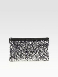 Sequined design finished with leather trim.Hinged closureOne inside zip pocketTwo inside open pocketsSatin lining11W X 7½H X ½DMade in Italy Sequined design finished with leather trim.Hinged closureOne inside zip pocketTwo inside open pocketsSatin lining11W X 7½H X ½DMade in Italy
