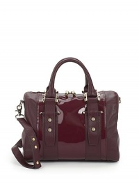 THE LOOKDouble top handlesRemovable, adjustable leather crossbody strapTop zip closureScrew head accentsProtective metal feetPatent leather trimTwo inside open pocketsOne inside zip pocketInside logo detailTHE MEASUREMENTCrossbody strap, 15-20 drop12W X 8H X 6DTHE MATERIALLeatherFully linedORIGINImported THE LOOKDouble top handlesRemovable, adjustable leather crossbody strapTop zip closureScrew head accentsProtective metal feetPatent leather trimTwo inside open pocketsOne inside zip pocketInside logo detailTHE MEASUREMENTCrossbody strap, 15-20 drop12W X 8H X 6DTHE MATERIALLeatherFully linedORIGINImported