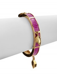 THE LOOKLizard skin accentsBamboo leaf charmsGoldplated brass settingElastic, slip-on designTHE MEASUREMENTWidth, about .5ORIGINMade in USA THE LOOKLizard skin accentsBamboo leaf charmsGoldplated brass settingElastic, slip-on designTHE MEASUREMENTWidth, about .5ORIGINMade in USA