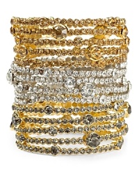 Bring glamorous shine to your looks with Aqua's golden station wrap bracelet. Bring glamorous shine to your looks with Aqua's golden station wrap bracelet.