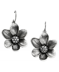 Take the time to stop and smell the flowers. These darling Fossil earrings feature intricate sculpted flowers crafted in silver tone mixed metal. Embellished with crystal accents for a sweet finish. Hangs on fishwire. Approximate drop: 1-1/2 inches. Take the time to stop and smell the flowers. These darling Fossil earrings feature intricate sculpted flowers crafted in silver tone mixed metal. Embellished with crystal accents for a sweet finish. Hangs on fishwire. Approximate drop: 1-1/2 inches.