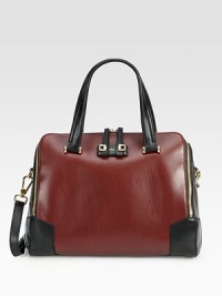 Traditional structured shape of sumptuous leather in contrasting tones, topped with gleaming goldtone hardware. Adjustable detachable shoulder strap, 11-12½ dropDouble top handles, 7 dropTop zip closureOne outside back zip pocketOne inside zip pocketThree inside open pocketsLeather lining13¾W X 10H X 6DImported Traditional structured shape of sumptuous leather in contrasting tones, topped with gleaming goldtone hardware. Adjustable detachable shoulder strap, 11-12½ dropDouble top handles, 7 dropTop zip closureOne outside back zip pocketOne inside zip pocketThree inside open pocketsLeather lining13¾W X 10H X 6DImported