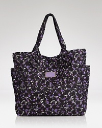 A MARC BY MARC JACOBS favorite, this nylon tote is heavy on style but light where it counts--over your shoulder. A MARC BY MARC JACOBS favorite, this nylon tote is heavy on style but light where it counts--over your shoulder.