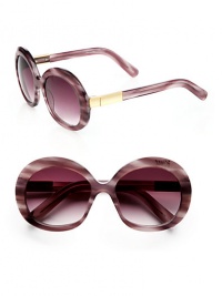 Inspired by the style icon, Jackie O, these round acetate shades feature a beveled matte gold temple. Available in shiny purple horn with brown gradient lens or shiny black with black mono lens.Beveled and matte gold metal temples100% UV protectionImported Inspired by the style icon, Jackie O, these round acetate shades feature a beveled matte gold temple. Available in shiny purple horn with brown gradient lens or shiny black with black mono lens.Beveled and matte gold metal temples100% UV protectionImported