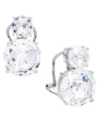 Never go easy on the sparkle. Eliot Danori's stunning stud earrings highlight two, round-cut cubic zirconias (9-1/2 ct. t.w.) set in silver tone mixed metal. Earrings feature a clip-on backing for non-pierced ears. Approximate drop: 3/4 inch. Never go easy on the sparkle. Eliot Danori's stunning stud earrings highlight two, round-cut cubic zirconias (9-1/2 ct. t.w.) set in silver tone mixed metal. Earrings feature a clip-on backing for non-pierced ears. Approximate drop: 3/4 inch.