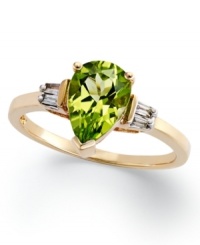 An elegant accent piece in your favorite hue. This exquisite ring features a pear-cut peridot (1-3/8 ct. t.w.) and round-cut diamond accents at the sides. Set in 14k gold. An elegant accent piece in your favorite hue. This exquisite ring features a pear-cut peridot (1-3/8 ct. t.w.) and round-cut diamond accents at the sides. Set in 14k gold.