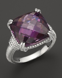 A gleaming purple crystal is framed in sterling silver on this timeless cushion ring from Judith Ripka. A gleaming purple crystal is framed in sterling silver on this timeless cushion ring from Judith Ripka.