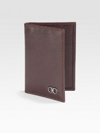 Single-fold wallet accented with signature double gancini silver ornament detail.Four card slotsLeather4W x 3HMade in Italy Single-fold wallet accented with signature double gancini silver ornament detail.Four card slotsLeather4W x 3HMade in Italy