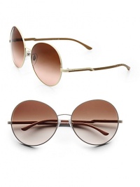 These retro-inspired metal frames have a sleek modern appeal. Available in pale gold/blond tortoise with brown gradient lens or cream/nude with brown gradient lens. Logo temples100% UV protectionMade in Italy These retro-inspired metal frames have a sleek modern appeal. Available in pale gold/blond tortoise with brown gradient lens or cream/nude with brown gradient lens. Logo temples100% UV protectionMade in Italy