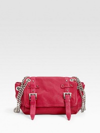 Chic and compact leather must-have detailed with cone studs, silvery buckles, oversized grommets and chains for a dash of downtown style.Double crossbody chains, 21 drop Magnetic snap flap closure Protective metal feet One inside zip pocket Fully lined 12W X 8H X 3½D Imported Chic and compact leather must-have detailed with cone studs, silvery buckles, oversized grommets and chains for a dash of downtown style.Double crossbody chains, 21 drop Magnetic snap flap closure Protective metal feet One inside zip pocket Fully lined 12W X 8H X 3½D Imported