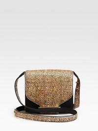 Luxurious haircalf in an exotic animal print with smooth leather accents.Adjustable shoulder strap, 12-23½ dropSlide flap closureThree inner compartmentsOne inside open pocketCotton lining6½W X 6H X 2½DImported Luxurious haircalf in an exotic animal print with smooth leather accents.Adjustable shoulder strap, 12-23½ dropSlide flap closureThree inner compartmentsOne inside open pocketCotton lining6½W X 6H X 2½DImported