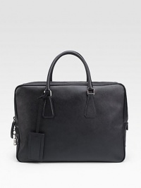 An elegant travel accessory is crafted in textured saffiano leather with top handles and a removable ID tag. Zip closureTop handlesID tagInterior zip pocketFully lined16W X 11H X 4LMade in Italy An elegant travel accessory is crafted in textured saffiano leather with top handles and a removable ID tag. Zip closureTop handlesID tagInterior zip pocketFully lined16W X 11H X 4LMade in Italy