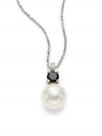 THE LOOKMother of pearl detailBlack and clear cubic zirconia accentsCircle chainSterling silver rhodium-plated settingLobster claspTHE MEASUREMENTPendant length, about 1 Length, about 17ORIGINImported THE LOOKMother of pearl detailBlack and clear cubic zirconia accentsCircle chainSterling silver rhodium-plated settingLobster claspTHE MEASUREMENTPendant length, about 1 Length, about 17ORIGINImported