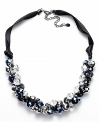 The perfect accent piece for your favorite little black dress. This elegant Ali Khan necklace features chic clusters of jet black and hematite-colored glass beads strung on a delicate black ribbon. Clasp crafted in mixed metal. Approximate length: 18 inches + 3-1/2 inch extender. Approximate drop: 3 inches. The perfect accent piece for your favorite little black dress. This elegant Ali Khan necklace features chic clusters of jet black and hematite-colored glass beads strung on a delicate black ribbon. Clasp crafted in mixed metal. Approximate length: 18 inches + 3-1/2 inch extender. Approximate drop: 3 inches.