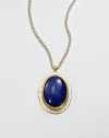 A beautiful, speckled lapis cabochon set in sterling silver and 24k gold on a link chain. LapisSterling silver24k goldLength, about 17.7Pendant size, about 1.2Lobster clasp closureImported 