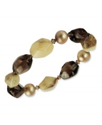 Earthy elements combine for a bohemian vibe. This pretty stretch bracelet features bronze-colored cultured freshwater pearls (9-10mm), smokey quartz (48-5/8 ct. t.w.), blue opal (61-1/5 ct. t.w.) and Swarovski Elements. Approximate length: 7-1/2 inches. Earthy elements combine for a bohemian vibe. This pretty stretch bracelet features bronze-colored cultured freshwater pearls (9-10mm), smokey quartz (48-5/8 ct. t.w.), blue opal (61-1/5 ct. t.w.) and Swarovski Elements. Approximate length: 7-1/2 inches.