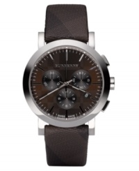 This Burberry watch features a brown check fabric strap and round stainless steel case. Dark brown textured sunray dial with black stick indices, logo, date window and three subdials. Swiss made. Quartz movement. Water resistant to 50 meters. Two-year limited warranty. This Burberry watch features a brown check fabric strap and round stainless steel case. Dark brown textured sunray dial with black stick indices, logo, date window and three subdials. Swiss made. Quartz movement. Water resistant to 50 meters. Two-year limited warranty.