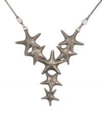 Adorn your neckline with a summery touch. Lucky Brand's Y-shaped starfish necklace comes in textured silver tone mixed metal. Approximate length: 22 inches. Approximate drop: 3-3/4 inches. Adorn your neckline with a summery touch. Lucky Brand's Y-shaped starfish necklace comes in textured silver tone mixed metal. Approximate length: 22 inches. Approximate drop: 3-3/4 inches.