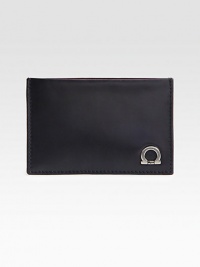 Italian calfskin leather card case with signature gancini ornament detail.Three card slotsLeather4W x 3HMade in Italy Italian calfskin leather card case with signature gancini ornament detail.Three card slotsLeather4W x 3HMade in Italy