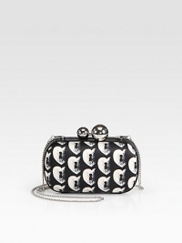 A bold clutch in nylon and leather, with a graphic heart-and-keyhole print and silvertone hardware.Detachable shoulder strap, 21 dropKiss-lock closureOne inside open compartmentFully lined6½W X 3½H X 1¾DImported A bold clutch in nylon and leather, with a graphic heart-and-keyhole print and silvertone hardware.Detachable shoulder strap, 21 dropKiss-lock closureOne inside open compartmentFully lined6½W X 3½H X 1¾DImported