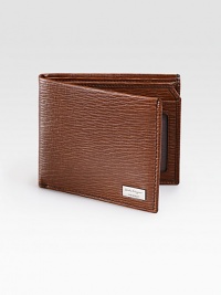 Stamped calfskin leather wallet is beautifully crafted in Italy featuring two credit card slots, two currency departments and one transparent Identification window.Two billfold compartmentsTwo card slotsOne Identification windowLeather4W x 3HMade in Italy Stamped calfskin leather wallet is beautifully crafted in Italy featuring two credit card slots, two currency departments and one transparent Identification window.Two billfold compartmentsTwo card slotsOne Identification windowLeather4W x 3HMade in Italy