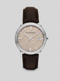 A sleek, sophisticated design set in stainless steel with leather strap and check-inspired dial.Round bezelQuartz movementWater resistant to 5ATMDate function at 3 o'clockSecond handStainless steel case: 38mm(1.49)Leather strapMade in Switzerland A sleek, sophisticated design set in stainless steel with leather strap and check-inspired dial.Round bezelQuartz movementWater resistant to 5ATMDate function at 3 o'clockSecond handStainless steel case: 38mm(1.49)Leather strapMade in Switzerland