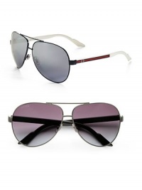 An enduring style in lightweight metal, finished with signature web striping and logo temple detail. Available in blue/white frames with smoke mirror gradient lenses or dark ruthenium/black frames with grey gradient lenses. Logo temple detail 100% UV protective Made in Italy An enduring style in lightweight metal, finished with signature web striping and logo temple detail. Available in blue/white frames with smoke mirror gradient lenses or dark ruthenium/black frames with grey gradient lenses. Logo temple detail 100% UV protective Made in Italy