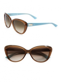 Playful and bursting with color, this retro-inspired acetate frame is sure to add interest to any look. Available in black and cream with grey gradient lens, tortoise and blush with brown gradient lens or tan/blue with brown gradient lens. Logo temples100% UV protectionImported Playful and bursting with color, this retro-inspired acetate frame is sure to add interest to any look. Available in black and cream with grey gradient lens, tortoise and blush with brown gradient lens or tan/blue with brown gradient lens. Logo temples100% UV protectionImported