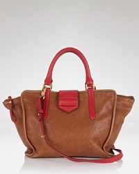 MARC BY MARC JACOBS is having a color block party. This spaciously sized leather tote taps this season's tonal leather trend, with practical, day-right allure. MARC BY MARC JACOBS is having a color block party. This spaciously sized leather tote taps this season's tonal leather trend, with practical, day-right allure.