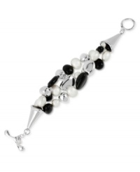 Eclectic elegance. This three-row bracelet from Robert Lee Morris is crafted from silver-tone mixed metal, and features black beads and simulated pearl accents clustered in a unique fashion for contemporary flair. Finished with a toggle closure. Approximate length: 8 inches. Eclectic elegance. This three-row bracelet from Robert Lee Morris is crafted from silver-tone mixed metal, and features black beads and simulated pearl accents clustered in a unique fashion for contemporary flair. Finished with a toggle closure. Approximate length: 8 inches.