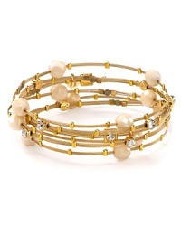 The Seasonal Whispers' girl loves to stack the brand's beautifully eclectic bracelets. This set is studded with Swarovski crystals and ivory beads, creating a cool bohemian statement. The Seasonal Whispers' girl loves to stack the brand's beautifully eclectic bracelets. This set is studded with Swarovski crystals and ivory beads, creating a cool bohemian statement.
