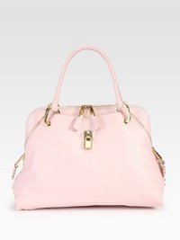 A chic and feminine style in supple leather with shiny, pyramid stud accents.Double top handles, 6½ dropTop zip closureTwo outside open pocketsOne inside zip pocketOne inside open pocketSuede lining16W X 11½H X 5DMade in Italy A chic and feminine style in supple leather with shiny, pyramid stud accents.Double top handles, 6½ dropTop zip closureTwo outside open pocketsOne inside zip pocketOne inside open pocketSuede lining16W X 11½H X 5DMade in Italy
