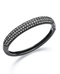 Sweet, contrasting colors play a standout part in your wardrobe. Charter Club's bold bangle features sparkling crystals that pop against a dark background. Crafted in hematite tone mixed metal. Approximate diameter: 2 inches. Sweet, contrasting colors play a standout part in your wardrobe. Charter Club's bold bangle features sparkling crystals that pop against a dark background. Crafted in hematite tone mixed metal. Approximate diameter: 2 inches.