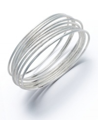 Easy slip-on style with a unique sandblast design. This chic bangle set by Alfani is crafted in silver tone mixed metal. Nine bangles included in set. Approximate diameter: 2-3/4 inches. Easy slip-on style with a unique sandblast design. This chic bangle set by Alfani is crafted in silver tone mixed metal. Nine bangles included in set. Approximate diameter: 2-3/4 inches.