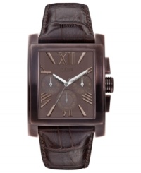 This classic dress watch from GUESS features rich brown leather and retro details. This classic dress watch from GUESS features rich brown leather and retro details.