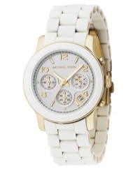 Crisp design with lasting style. This Michael Kors watch features a white polyurethane and goldtone mixed metal bracelet and round case. White chronograph dial with goldtone stick indices & numerals, logo, date window and three subdials. Quartz movement. Water resistant to 100 meters. Two-year limited warranty. Crisp design with lasting style. This Michael Kors watch features a white polyurethane and goldtone mixed metal bracelet and round case. White chronograph dial with goldtone stick indices & numerals, logo, date window and three subdials. Quartz movement. Water resistant to 100 meters. Two-year limited warranty.