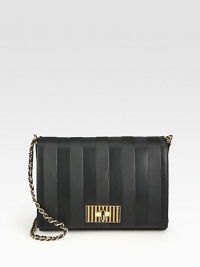This embossed leather style has an elegant striped style with a sophisticated leather accented chain strap and a signature closure.Detachable adjustable shoulder strap, 10½-19 dropTurnlock flap closureTwo inner compartmentsOne inside zip pocketCotton lining11½W X 9½H X 4DMade in Italy This embossed leather style has an elegant striped style with a sophisticated leather accented chain strap and a signature closure.Detachable adjustable shoulder strap, 10½-19 dropTurnlock flap closureTwo inner compartmentsOne inside zip pocketCotton lining11½W X 9½H X 4DMade in Italy
