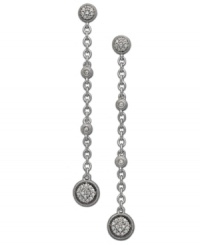 Dazzling drop earrings turn up the volume on any look. Set in sterling silver, this glam style features four stations accented by round-cut diamonds (1/4 ct. t.w.). Approximate drop: 1 inch. Dazzling drop earrings turn up the volume on any look. Set in sterling silver, this glam style features four stations accented by round-cut diamonds (1/4 ct. t.w.). Approximate drop: 1 inch.