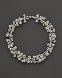 Inspired by Zen philosophy, this intricately detailed sterling silver bracelet from Paul Morelli softly jingles with meditation bells. Inspired by Zen philosophy, this intricately detailed sterling silver bracelet from Paul Morelli softly jingles with meditation bells.