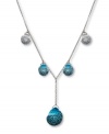 Dazzling and dramatic. Aquarmarine-hued crystals combine with clear crystal Pointiage® accents to enhance the beauty of Swarovski's Play Indicolite Y pendant necklace. Set in silver tone mixed metal. Approximate length: 15-7/10 inches. Approximate drop: 1-1/2 inches.