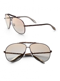 Matte metal aviators get a fancy update with abstract metal temples and brow bar. Available in bronze with gradient brown lens.Abstract metal temples100% UV protectionMade in Italy Matte metal aviators get a fancy update with abstract metal temples and brow bar. Available in bronze with gradient brown lens.Abstract metal temples100% UV protectionMade in Italy