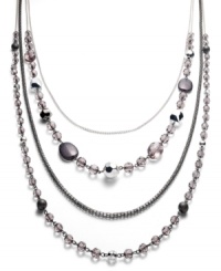 Layer on luxe length with this multi-row necklace from Style&co. Bronze and gold glass stones illuminate your look. Crafted in silver tone and hematite tone mixed metal. Approximate length: 30 inches. Layer on luxe length with this multi-row necklace from Style&co. Bronze and gold glass stones illuminate your look. Crafted in silver tone and hematite tone mixed metal. Approximate length: 30 inches.