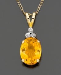 Oval-cut citrine( 2.2 ct. t.w.) crowned with diamond accents and mounted in polished 14k gold. Chain measures 18 inches. Oval-cut citrine( 2.2 ct. t.w.) crowned with diamond accents and mounted in polished 14k gold. Chain measures 18 inches.