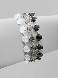 Three strands of shimmering Swarovski crystals in jet, opal and smoke shades, richly faceted in polished prong settings.CrystalSilverplatedLength, about 6¾Width, about 1Lobster claspMade in Italy Three strands of shimmering Swarovski crystals in jet, opal and smoke shades, richly faceted in polished prong settings.CrystalSilverplatedLength, about 6¾Width, about 1Lobster claspMade in Italy