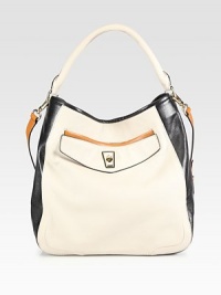 An indulgent supple leather design in a colorblock style with a turn-lock detail.Top handle, 4½ dropDetachable adjustable shoulder strap, 14-17½ dropMagnetic top closureOne outside open pocketOne outside turn-lock pocketOne inside zip pocketTwo inside open pocketsFully lined15½W X 13H X 6DImported An indulgent supple leather design in a colorblock style with a turn-lock detail.Top handle, 4½ dropDetachable adjustable shoulder strap, 14-17½ dropMagnetic top closureOne outside open pocketOne outside turn-lock pocketOne inside zip pocketTwo inside open pocketsFully lined15½W X 13H X 6DImported
