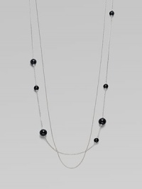A long, delicate piece with beautiful round black agate stations on one of the two sterling silver link chains. Black agateSterling silverLength, about 39¾Clasp closureImported A long, delicate piece with beautiful round black agate stations on one of the two sterling silver link chains. Black agateSterling silverLength, about 39¾Clasp closureImported