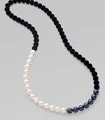 From the Night Blue Collection. This high contrast piece features a strand of flocked velvet beads accented with white and black pearlized glass beads. Length, about 34½ Slip-on style Imported 