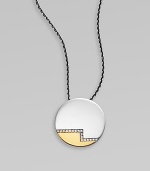 From the Nile Collection. A sleek modern disk of sterling silver and golden finishing, with a stepped row of shimmering white topaz, on a silver box chain.White topazSterling silverGoldplatedChain length, adjusts from about 16-18Pendant diameter, about 1Lobster claspImported