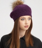 The perfect cool-weather accessory in an ultra-soft angora blend with dyed raccoon fur pom-pom.Ribbed brimDyed raccoon fur70% polyester/30% angoraDry cleanImportedFur origin: USA