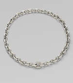 From the Chain Collection. A simply chic style featuring alternating smooth and cable links with a brilliant center link encrusted in diamonds. Sterling silverDiamonds, .81 tcwLength, about 17Push clasp closureImported 